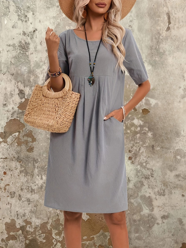 Femme portant Robes Milara | Robe vintage élégante à manches courtes
