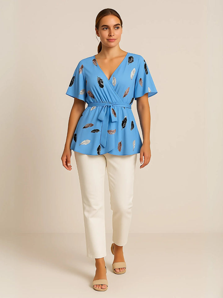 Femme portant Blouse Milayana | Blouse cache - cœur fleurie chic