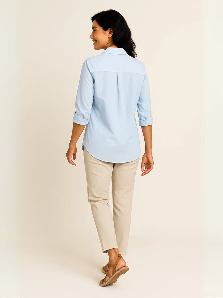 Femme portant Blouse Milindra | Blouse uni manches courtes fluide