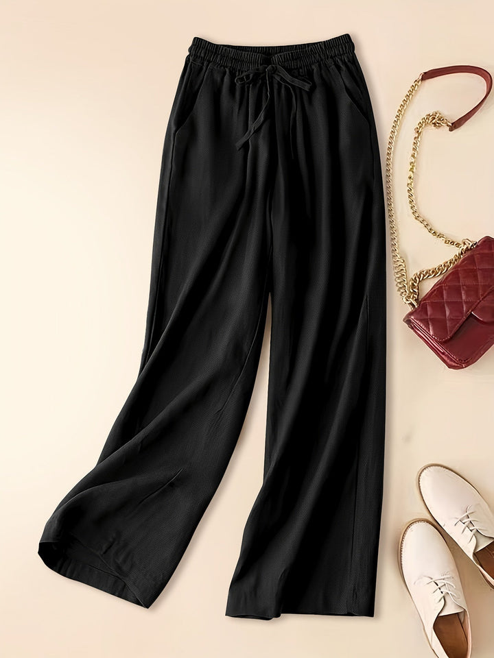 Femme portant Pantalon Large Miraya | Pantalon large en viscose tissée